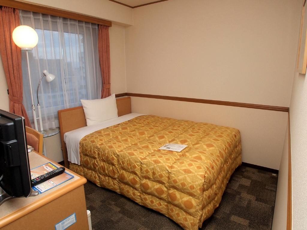 Toyoko Inn Hokkaido Asahikawa Ekimae Ichijo Dori Exterior foto